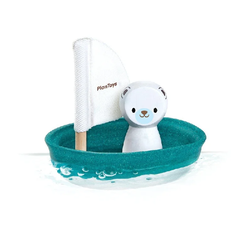 - Organic cotton dog bibsPlan Toys polar bear sailing boat